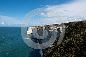 Scenic shot of cliffs along the coastline of Etretat in Normandy, France