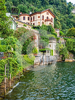 Scenic sight in Torno, colorful and picturesque village on Lake Como. Lombardy, Italy. photo