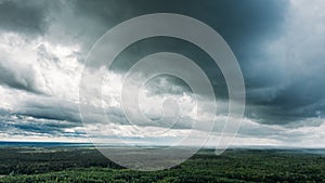 Scenic Sky With Rain Clouds Over Green Forest Landscape. Spring Summer Rainy Weather