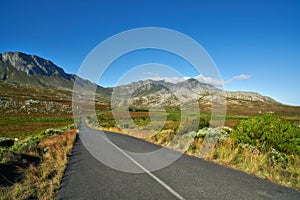 Scenic South Africa. A country road meandering through a picturesque landscape.