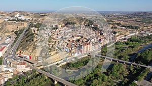 Scenic spring aerial view of El casco or Fraga la Vieja, old historic district of Spanish town of Fraga located on hilly