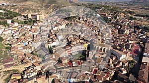 Scenic spring aerial view of El casco or Fraga la Vieja, old historic district of Spanish town of Fraga located on hilly