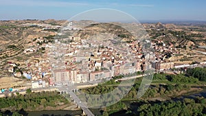 Scenic spring aerial view of El casco or Fraga la Vieja, old historic district of Spanish town of Fraga located on hilly