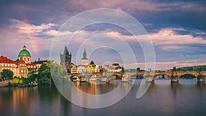 Scenic spring sunset aerial view of the Old Town pier architecture and Charles Bridge over Vltava river in Prague, Czech Republic