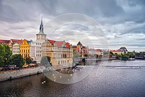 Scenic spring view of the Old Town pier architecture and Charles Bridge over Vltava river in Prague, Czech Republic