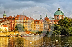 Scenic spring view of the Old Town pier architecture and Charles Bridge over Vltava river in Prague, Czech Republic