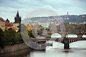 Scenic spring view of the Old Town pier architecture and Charles Bridge over Vltava river in Prague, Czech Republic