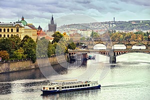 Scenic spring view of the Old Town pier architecture and Charles Bridge over Vltava river in Prague, Czech Republic