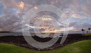 Scenic stitched panorama of a sunset over Pacific ocean,  Big Island, Hawaii.