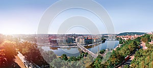 Scenic summer sunrise aerial view of the Old Town pier architecture and Charles Bridge over Vltava river in Prague, Czech Republic