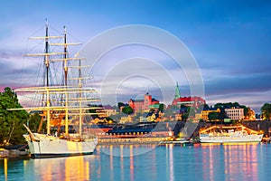 Scenic summer sunset panorama of architecture with vintage retro ship in Stockholm, Sweden