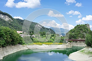 Scenic summer view of the Arsie and Lake Corlo in Italy surrounded by the Alps.