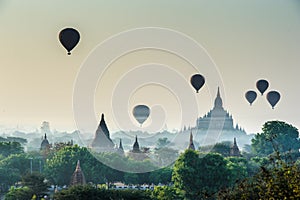 Scenic sunrise with many hot air balloons in Myanmar Travel