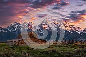 Scenic sunrise, rustic barn, Teton range