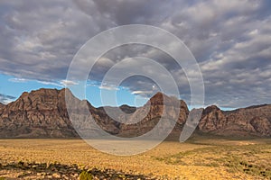 Scenic sunrise view of limestone peaks Mount Wilson, Bridge and Rainbow Mountain of Red Rock Canyon National Conservation