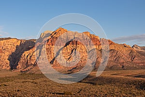 Scenic sunrise view of limestone peaks Mount Wilson, Bridge and Rainbow Mountain of Red Rock Canyon National Conservation