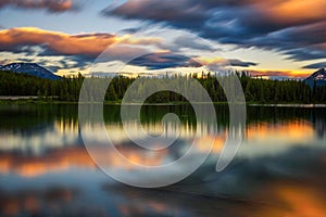 Sunset over Herbert Lake in Banff National Park, Alberta, Canada photo