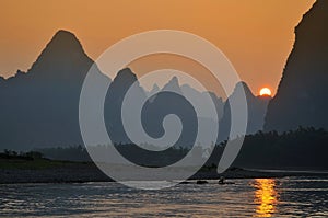 Scenic sunset over Karst mountains formations in Guilin, one of China most popular tourist destinations