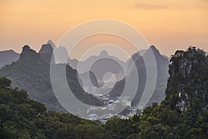 Scenic sunset over Karst mountains in Guilin, China