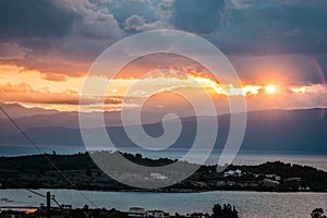 Scenic sunset over the sea in Portoheli on Peloponnese in Greece