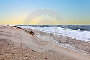 Scenic sunset in Sylt with ocean, dune and empty beach