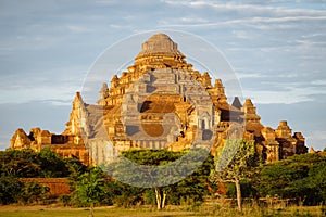 Scenic sunset view of ancient temple Dhammayangyi in Bagan