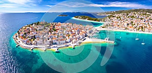 Scenic town and beaches of Primosten aerial panoramic view photo