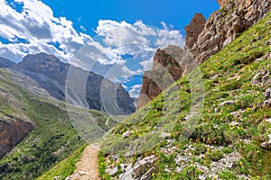 Scenic trail for hiking leading to the top of the Sassongher mountain. Italian Dolomites, Colfosco - Alta Badia.