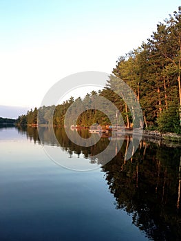 Scenic tranquil landscape at the French river in northern Ontario with lake and forest