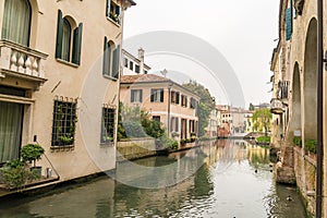 Scenic of treviso town with calnal scene