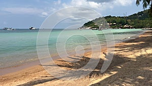 Scenic tropical sunny sandy empty Sairee beach landscape on Koh Tao island