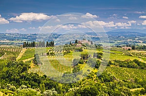 Scenic Tuscany landscape with rolling hills and valleys photo
