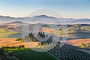 Scenic Tuscany landscape at sunrise, Val d`Orcia, Italy