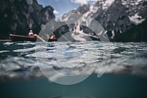 Scenic underwater view of famous braies lake in italy
