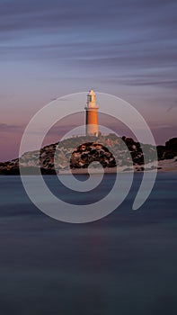 Scenic vertical shot of the Bathurst Lighthouse located in Rottnest Island, Australia