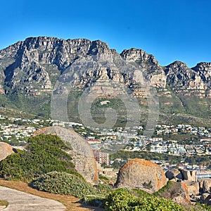 Scenic view of 12 apostles mountain range overlooking nearby homes in the suburb of Camps bay, Cape Town..Landscape of