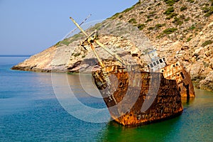 Scenic view of abandoned rusty shipwreck, Amorgos island