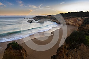 Scenic view of the Alemao Beach Praia do Alemao at sunset, in Portimao