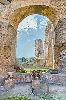 Scenic view through the arch and columns on the ruins of ancient Roman Baths of Caracalla