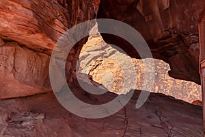 Scenic view of arch rock formation seen from the staircase of Atlatl rock in Valley of Fire State Park in Mojave desert
