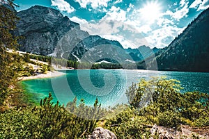 Scenic view of the Baires Lake in the Dolomite mountains in the afternoon, Italy photo