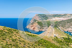 Scenic view of Balaclava bay with yachts and ruines of Genoese fortress Chembalo. Balaklava, Sevastopol, Crimea. The concept of an