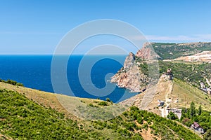 Scenic view of Balaclava bay with yachts and ruines of Genoese fortress Chembalo. Balaklava, Sevastopol, Crimea. The concept of an