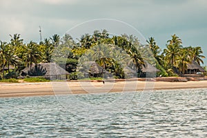 Scenic view of beach against resort in Manda Island, Lamu, UNESCO World Heritage Site in Kenya