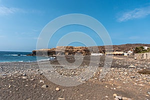 Scenic view of the beach of Ajuy under a peaceful sky in Pajara, Spain