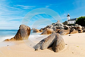 Scenic view of beach and lighthouse in Brittany