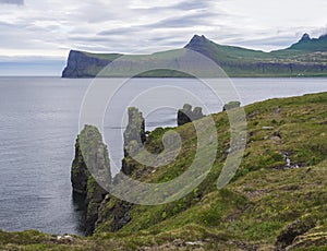 Scenic view on beautiful Hornbjarg cliffs in west fjords, remote nature reserve Hornstrandir in Iceland, with big bird cliff rocks photo