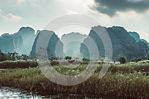 Scenic view of beautiful karst scenery and rice paddy fields