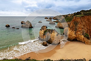 Scenic view of the beautiful Praia do Alemao and the Ponta Joao de Arens in Portimao, Algarve photo