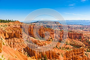 Scenic view of beautiful red rock hoodoos and the Amphitheater from Sunset Point, Bryce Canyon National Park, Utah, United States photo
